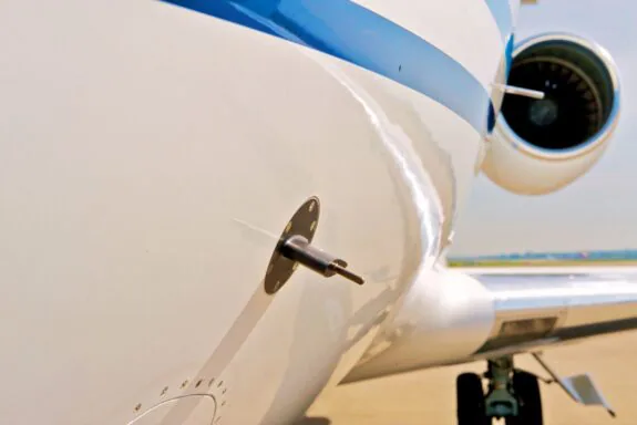 Close-up of a private aircraft fuselage and engine