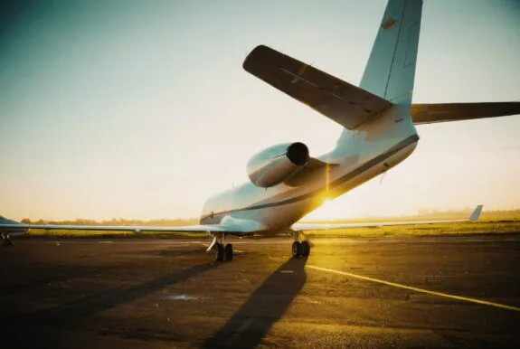 Private aircraft parked on an airport tarmac